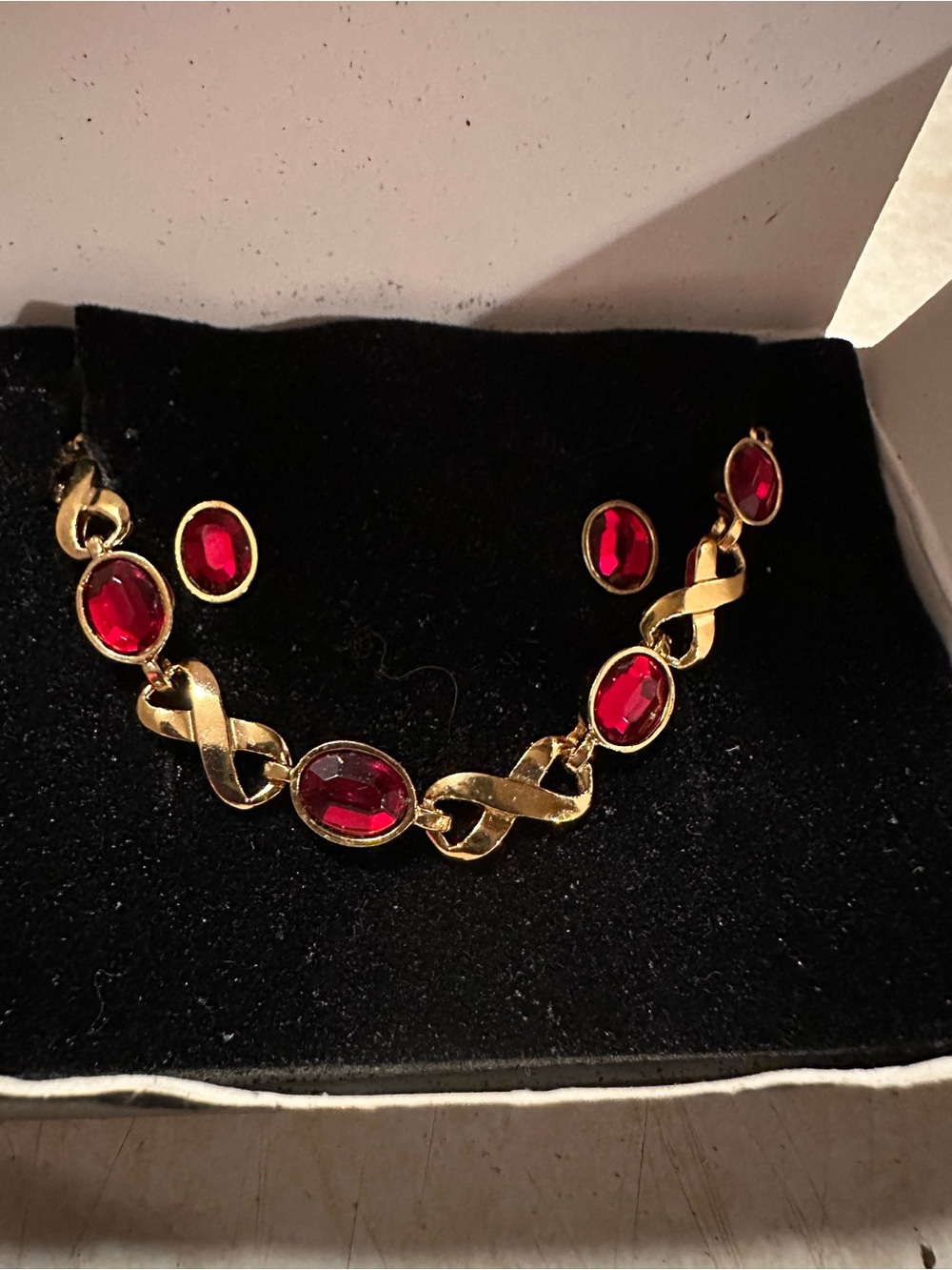 Vintage Avon 1994 Gold-Tone bracelet& Earrings Set with Red Stones